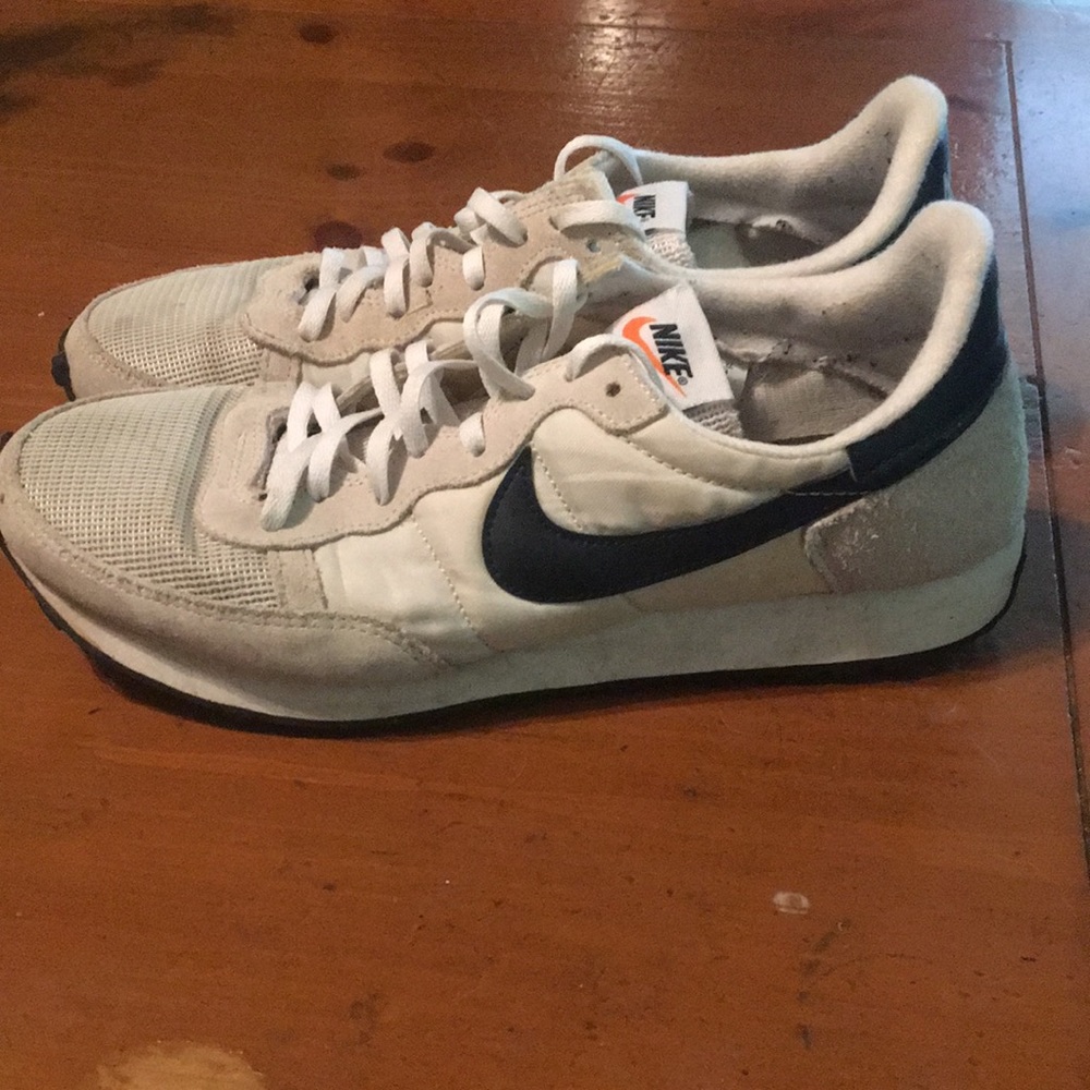 Nike running shoes. White and stone color